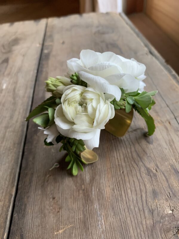 wrist corsage on brass cuff