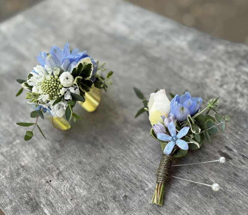 blue and white bout and corsage
